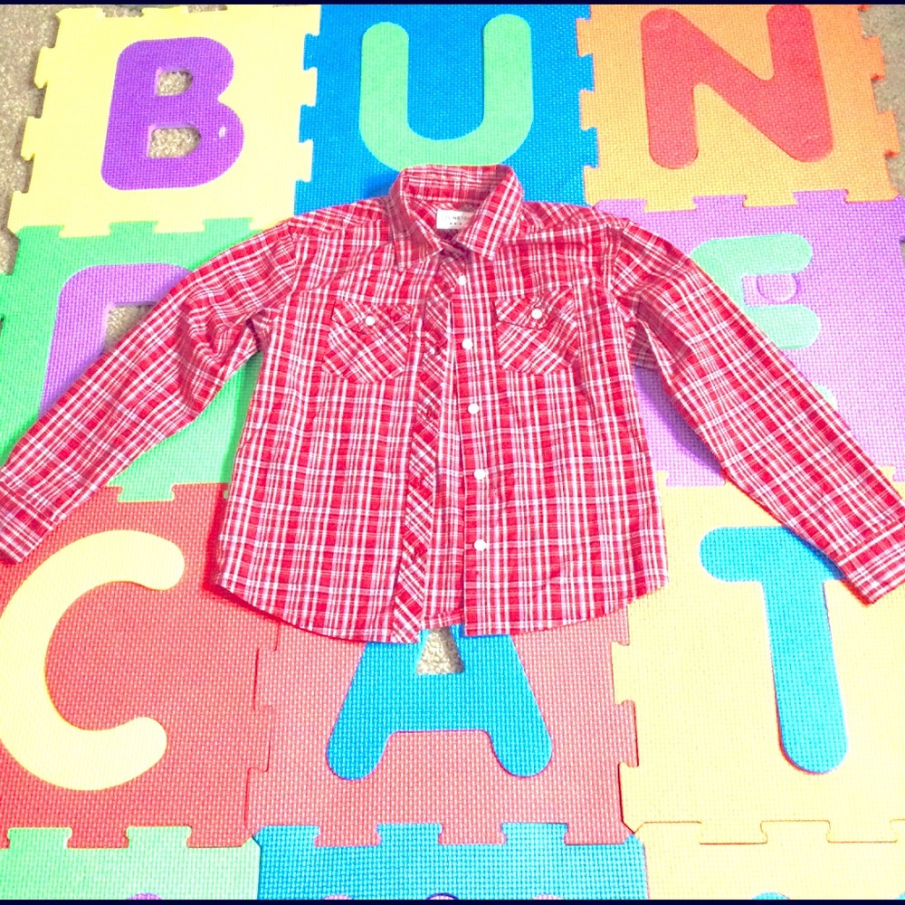 - - Covington boy’s youth flannel shirt . Lrge.